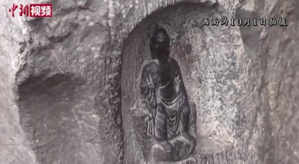 ▲洛陽龍門石窟千年佛像被摸到「包漿」。（圖／翻攝自中新社，下同）
