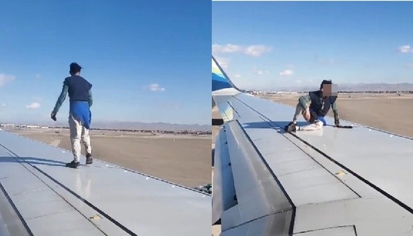飛機將起飛「發現怪男站在機翼上」　乘客目睹他狂擺Pose傻眼！（圖／翻攝自twitter／ErinInWA）