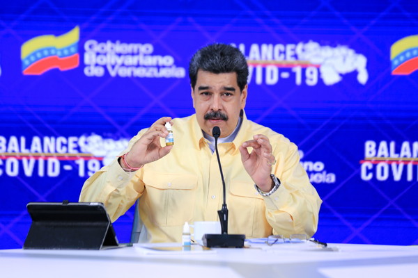 ▲▼委內瑞拉總統馬杜洛公開一種能治療新冠的「神奇藥水」。（圖／路透）