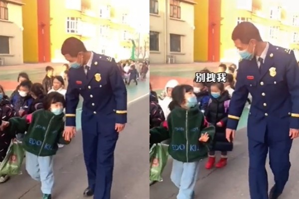 消防員爸爸接5歲女兒放學，牽手被甩開。（圖／翻攝自微博／晉中消防）