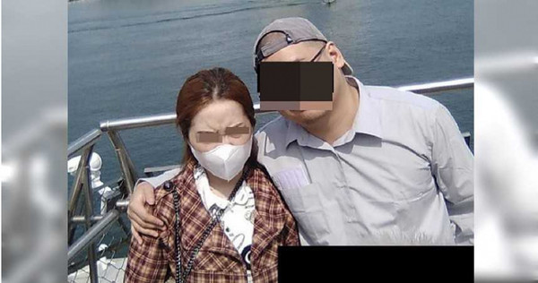 李男為了尋妻公布自己與越南籍妻子的合照，照片中女方眉頭深鎖，被網友稱為「厭世越南妻」。（圖／讀者提供）