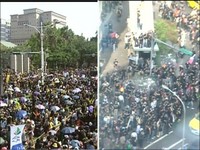 忠孝東路口，黑衫軍白衫軍互尬。