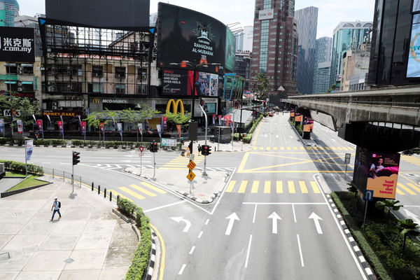 ▲▼馬來西亞28日宣布6月將進行為期2周的全面封鎖，圖為吉隆坡5月11日的空曠街景。（圖／路透）