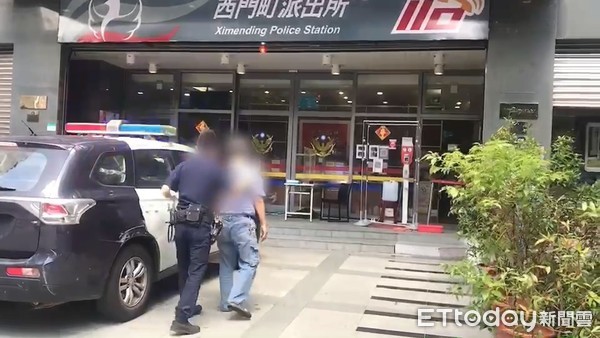 ▲萬華警方18日上午帶回涉嫌幫兇嫌租車的黃姓男子偵訊。（圖／記者張君豪翻攝）