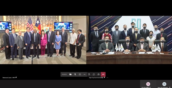 ▲▼台北市長柯文哲和休士頓市長席維斯特‧透納簽署重申友好關係協議。（圖／北市府提供）