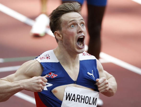 ▲▼「挪威跨欄天才」沃爾霍姆（Karsten Warholm）參加東京奧運男子400公尺跨欄決賽，以45秒94的成績再次刷新世界紀錄。（圖／路透）