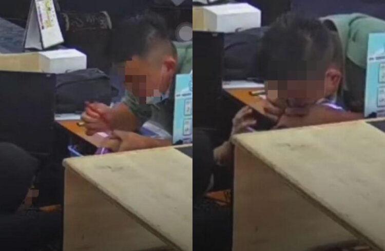 ▲▼ 馬來西亞噁男緊握女店員的手猛吸。（圖／翻攝自YouTube）