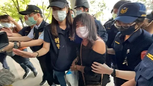 ▲▼高雄城中城火警涉案情侶到案。（圖／記者吳世龍攝）