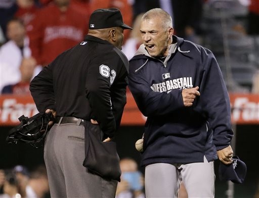 洋基總教練吉拉迪(右)氣到血管爆出來。(圖／達志影像／美聯社)