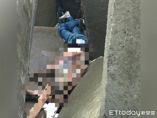 ▲▼台北港消波塊內驚見海流屍。（圖／記者陳豐德翻攝）