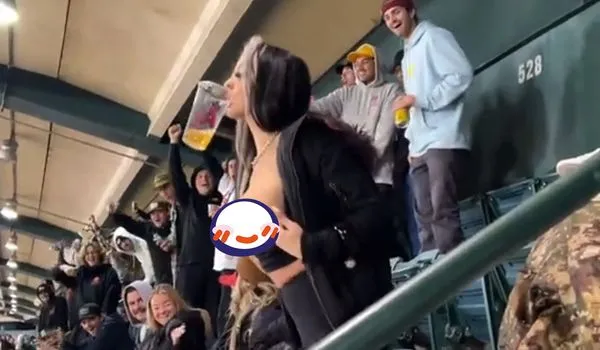 ▲▼  美國女子看比賽太興奮，扯掉上衣露乳。（圖／翻攝自推特）