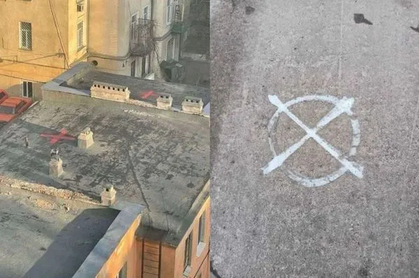 屋頂出現「十字狀」神秘符號　基輔人嚇壞：我家是俄軍轟炸目標。（圖／翻攝自Twitter）