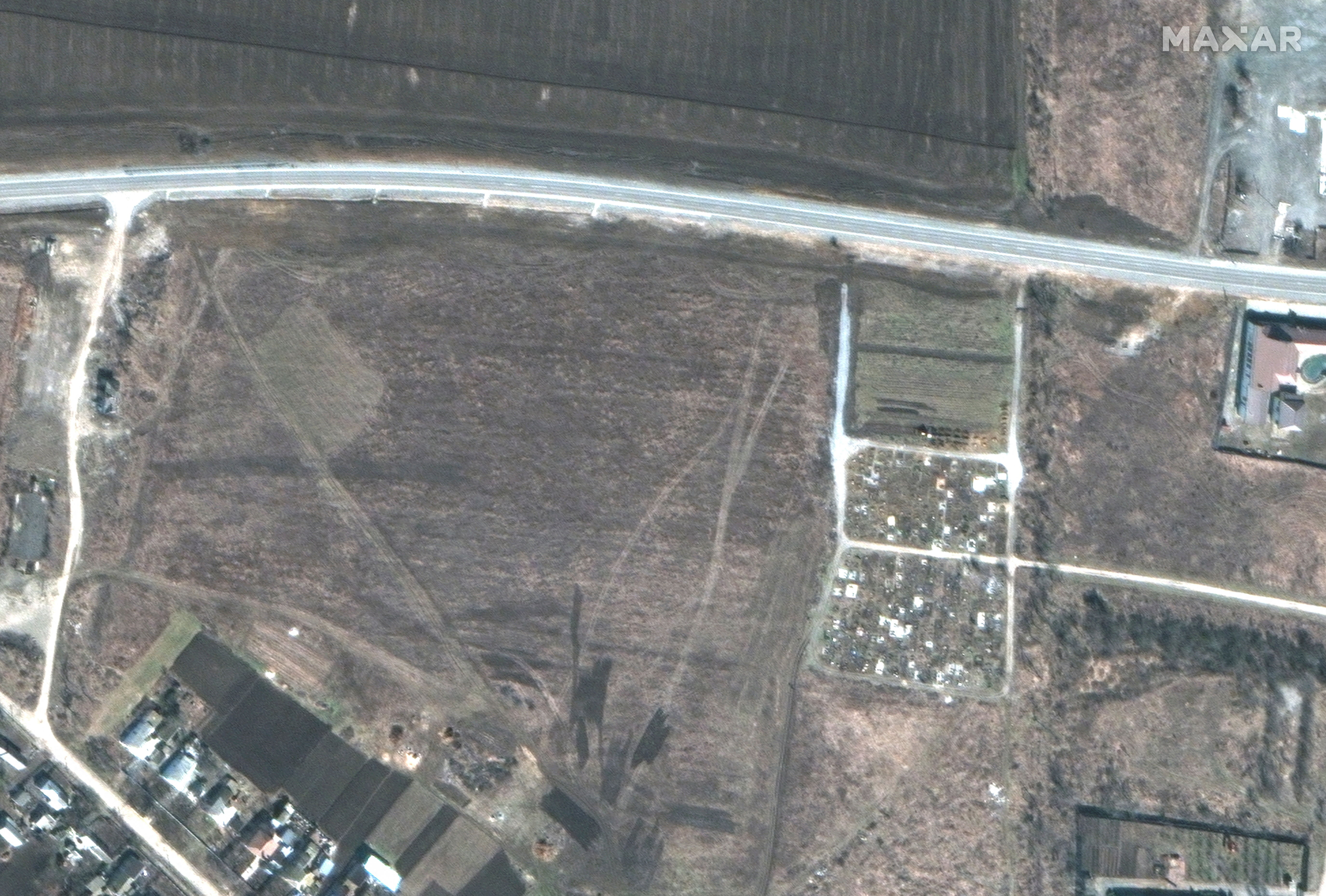 ▲▼馬力波西部城郊曼古什，在俄軍挖亂葬崗前，該處還是一大片空地，圖像攝於3月19日。（圖／路透社）