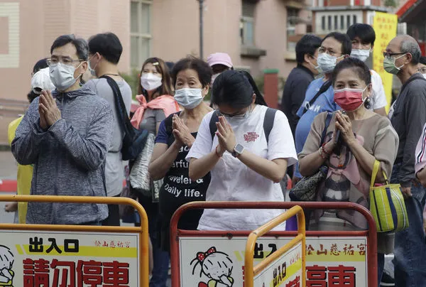 ▲▼本土疫情持續嚴峻，確診數連續數日破千。（圖／達志影像／美聯社）