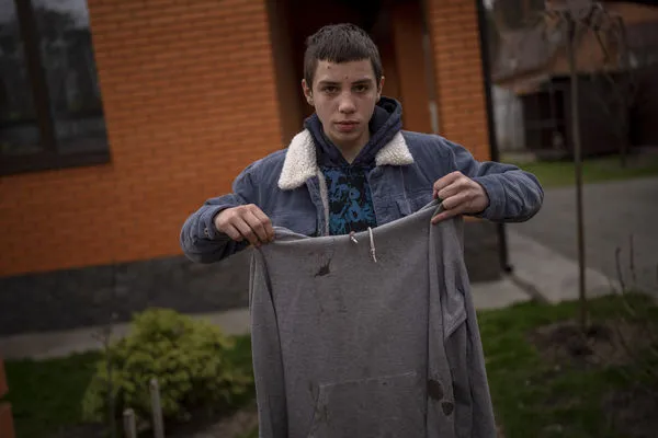 ▲▼涅奇波倫柯和父親在布查外出時，不幸遭俄羅斯士兵槍擊，他的父親被當街殺害。（圖／達志影像／美聯社）