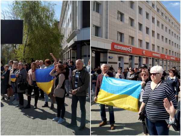 ▲▼陷入俄羅斯控制的烏克蘭南部赫爾松（Kherson）民眾於4月27日走上街頭抗議，手持烏克蘭國旗表達訴求，卻遭到催淚瓦斯驅散。（圖／路透）