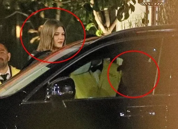 李奧納多（右）被拍到與23歲新女伴維多莉亞（左）同車夜遊。（翻攝自推特）