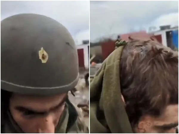 ▲▼烏克蘭士兵頭盔被射穿，但他除了輕微擦傷並無大礙。（圖／翻攝自推特@nexta_tv）
