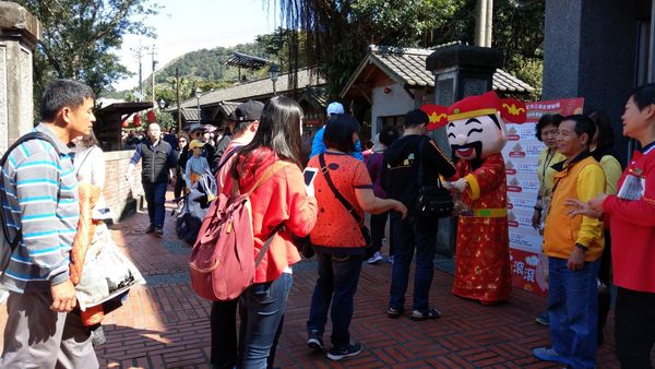 ▲黃金博物館名家揮毫送春聯 財神「大著金」迎春納福。（圖／新北市立黃金博物館提供）