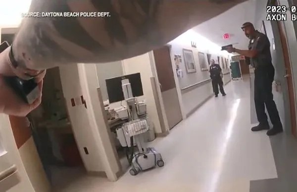 ▲▼佛州76歲老婦在醫院病房槍殺絕症丈夫，警方公布隨身錄影器畫面。（圖／翻攝自YouTube）