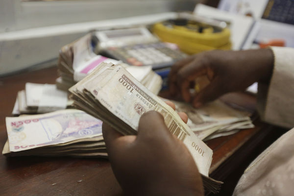 ▲▼奈及利亞換新鈔卻印製不足，全國陷入紙鈔危機。（圖／達志影像／美聯社）
