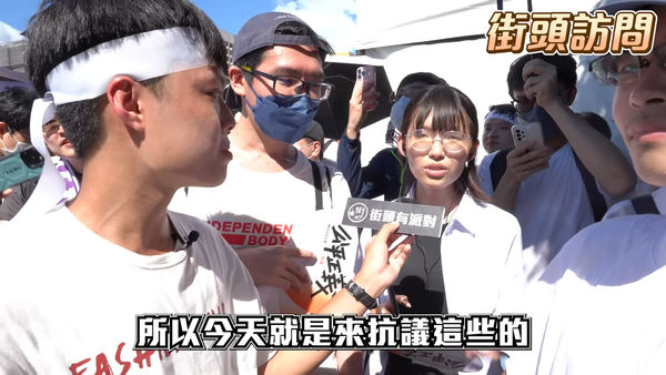 ▲▼716遊行街訪到「民眾黨黨代表」遭出征　Youtuber發4點聲明回應四叉貓。（圖／翻攝街頭有派對【木炭民調】YouTube）