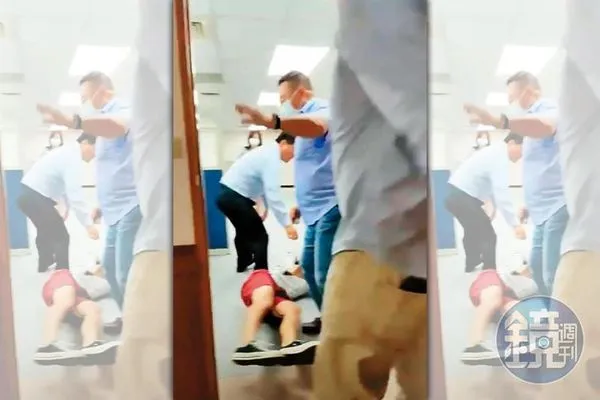 陶存良（穿紅色短褲者）到公司找舅舅溝通，卻被員工圍毆、壓制在地。（讀者提供）