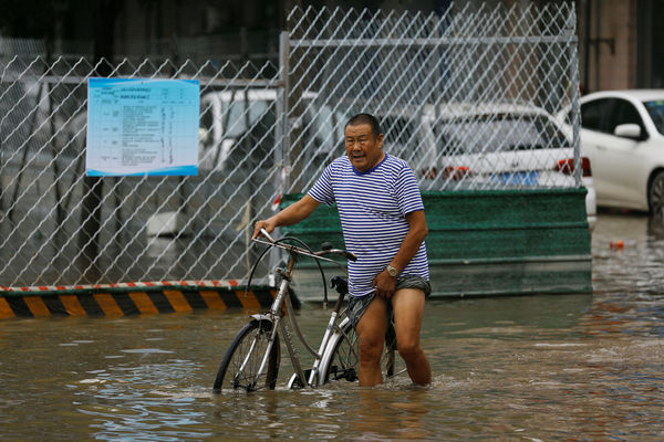 ▲▼北京暴雨淹水。（圖／路透社）