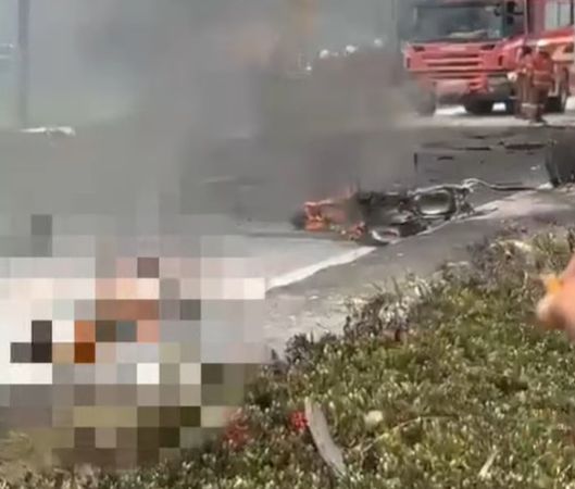 ▲▼馬來西亞墜機事件導致一名機車騎士被活活燒死。（圖／翻攝自Facebook）