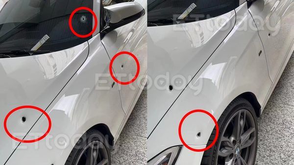 ▲被開槍的白色BMW，車身有4顆彈孔             。（圖／民眾提供）
