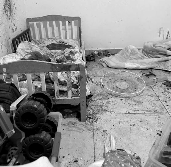▲▼以色列邊境城鎮遭哈馬斯侵略，救難人員拍攝到育嬰室血淋淋的相片，畫面已經灰階處理。（圖／南方第一救難隊）
