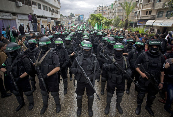 ▲▼巴勒斯坦槍手2014年在加薩市，慶祝哈瑪斯成立27周年。（圖／達志影像／美聯社）