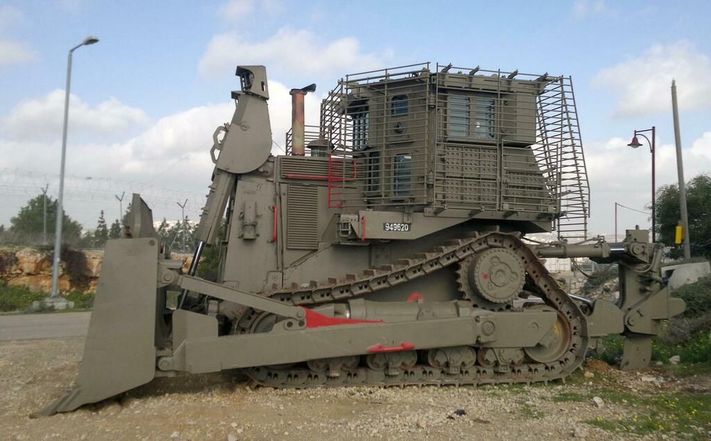 ▲▼以色列在加薩邊境部署了開拓重工D9R重型裝甲推土機。（圖／翻攝自X）