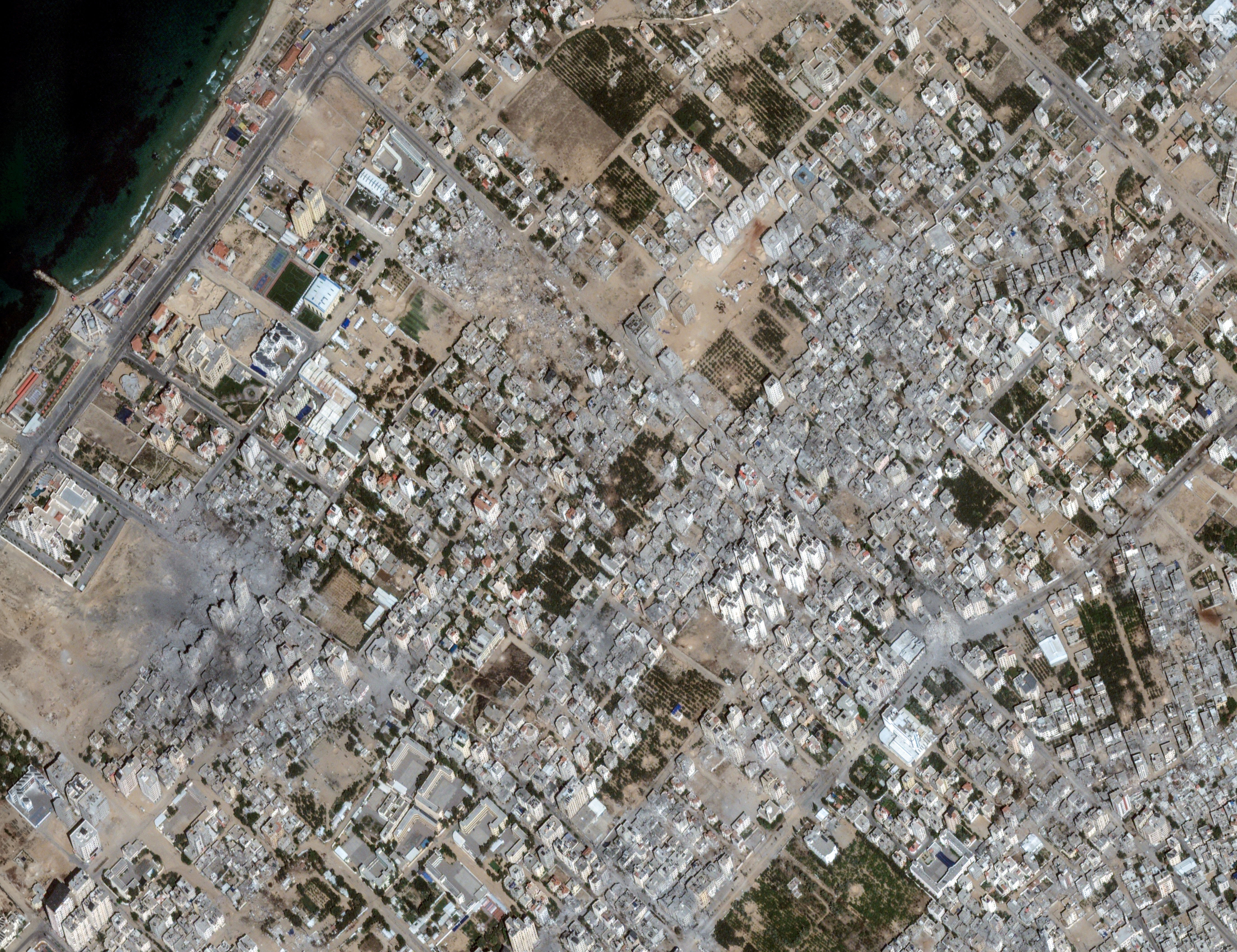 ▲▼ 加薩北部的卡拉馬（Al－Karama）2023年10月21日衛星影像。（圖／路透）