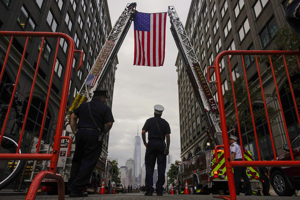 911事件，美國各地掉舉辦追悼會。（圖／路透社）