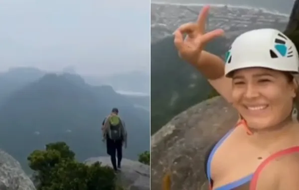 女遊客在懸崖開心自拍　導遊站她後方「突然被雷劈」奪命畫面曝。（圖／翻攝自推特）