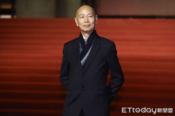 ▲第60屆金馬獎星光大道，頒獎嘉賓羅家英。（圖／記者林敬旻攝）