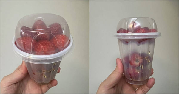 網友買來的90元「滿杯草莓」側看其實是中空的「懸浮杯」。（圖／翻攝自臉書／新竹大小事）