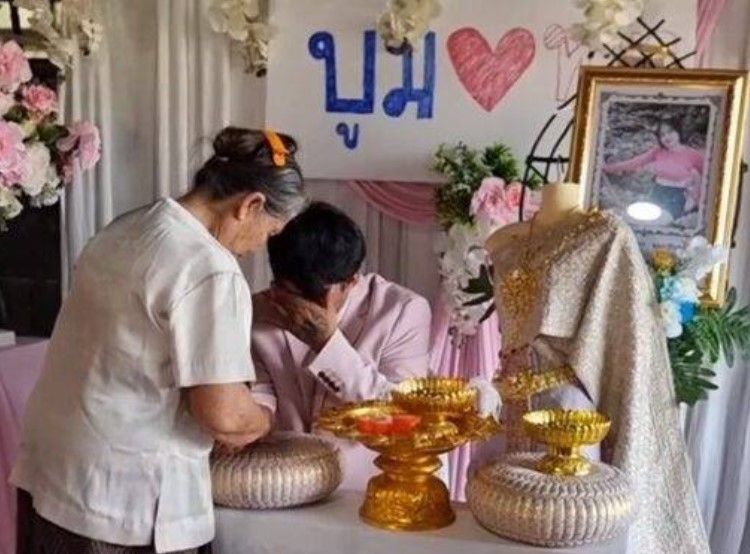 ▲▼泰國一名男子為了履行與女友的婚約，在對方的喪禮上舉行婚禮。（圖／翻攝自TikTok）