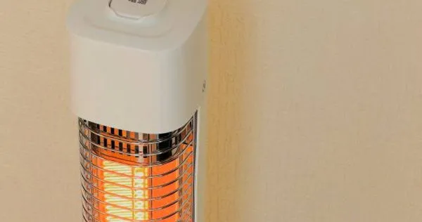 許多人冬天會開電暖器，但使用電器也要注意安全。（示意圖／翻攝自photoAC）