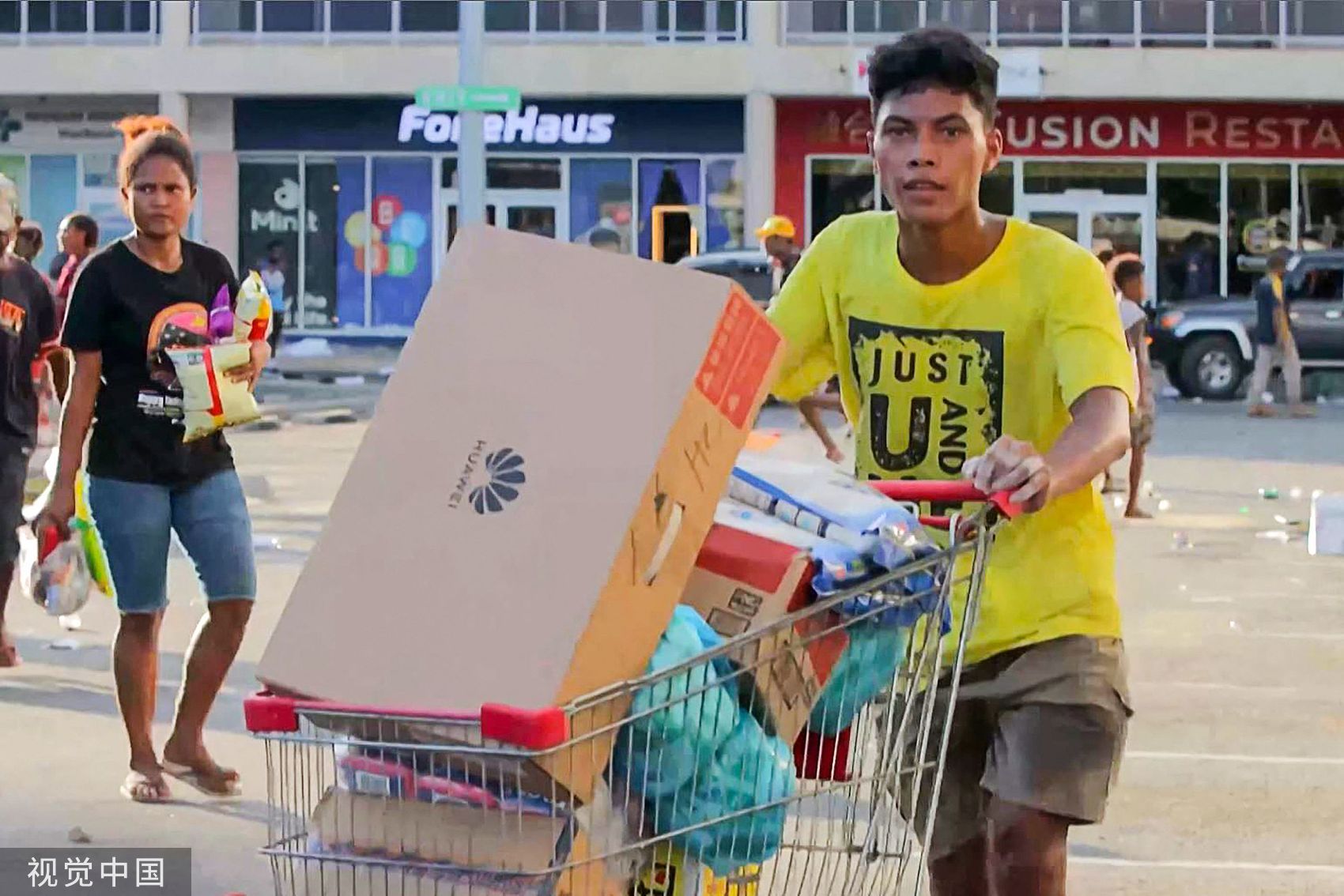 ▲▼    巴布亞紐幾內亞爆發大規模搶劫縱火事件。（圖／CFP）