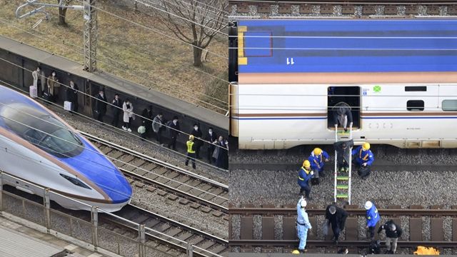 ▲▼日本新幹線23日因斷電停駛，民眾下列車沿著軌道徒步。（圖／CFP）