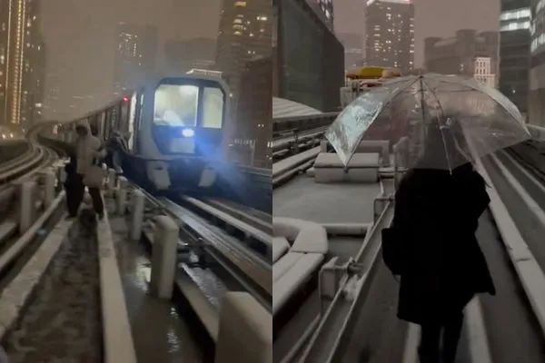▲▼百合海鷗號2輛列車停駛，約550名乘客被迫在大雪中從軌道步行到汐留車站。（圖／翻攝自X）