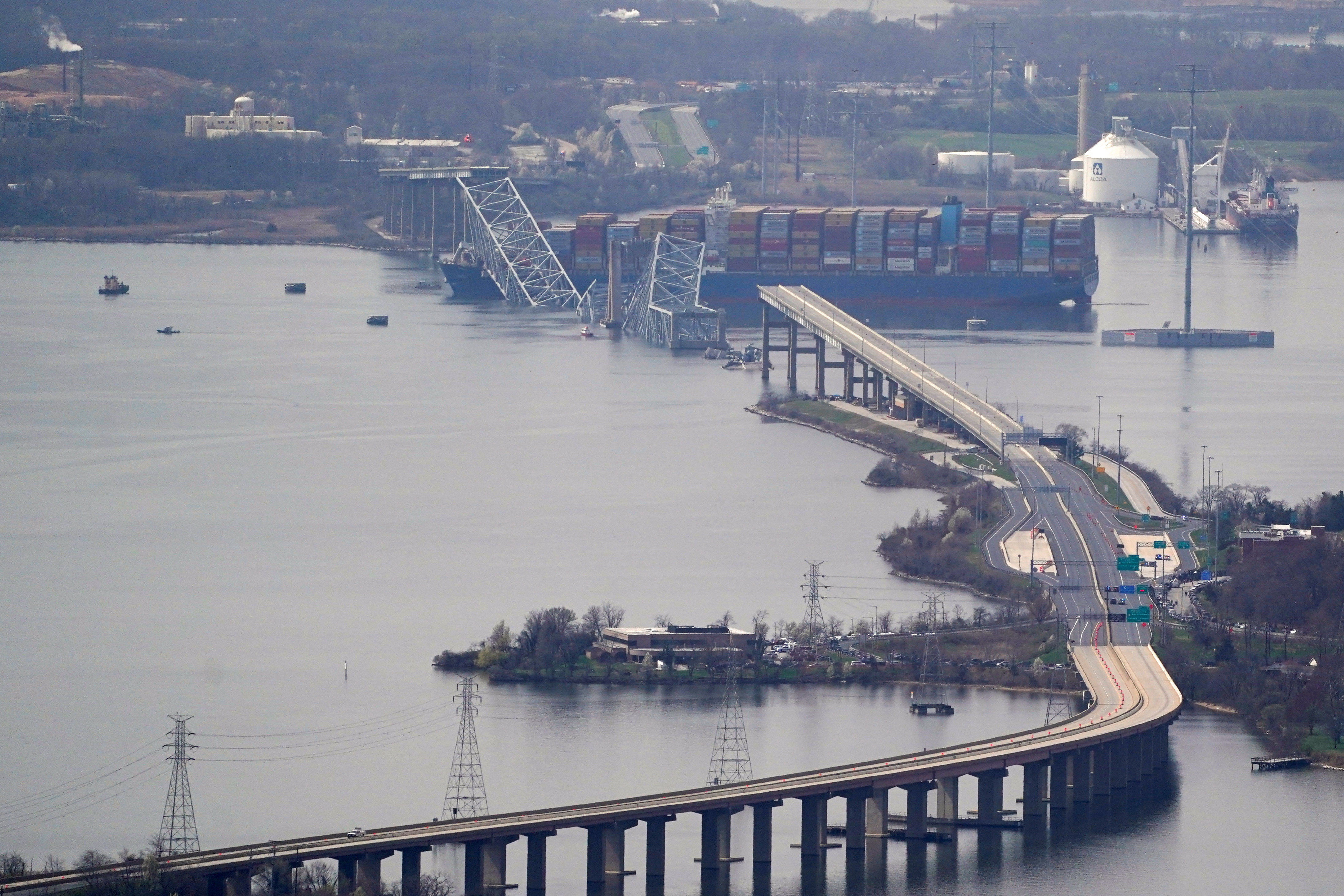 ▲▼美國馬里蘭州巴爾的摩市（Baltimore）凱伊橋（Francis Scott Key Bridge）26日凌晨遭達利號（Dali）貨輪撞斷。（圖／路透）
