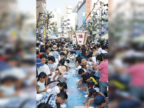 ▲▼日本神奈川縣藤澤市的「世界最大撈金魚」活動宣布廢止，未來不再舉辦。（圖／翻攝自「藤沢市商店会連合会」官網）