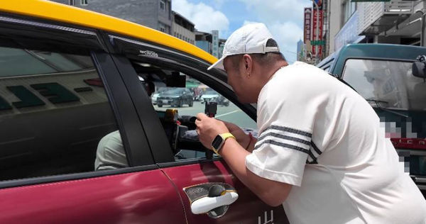 中國籍網紅來台旅遊，取消計程車卻被收了100元。（圖／翻攝自Sean逛吃TV YouTube）