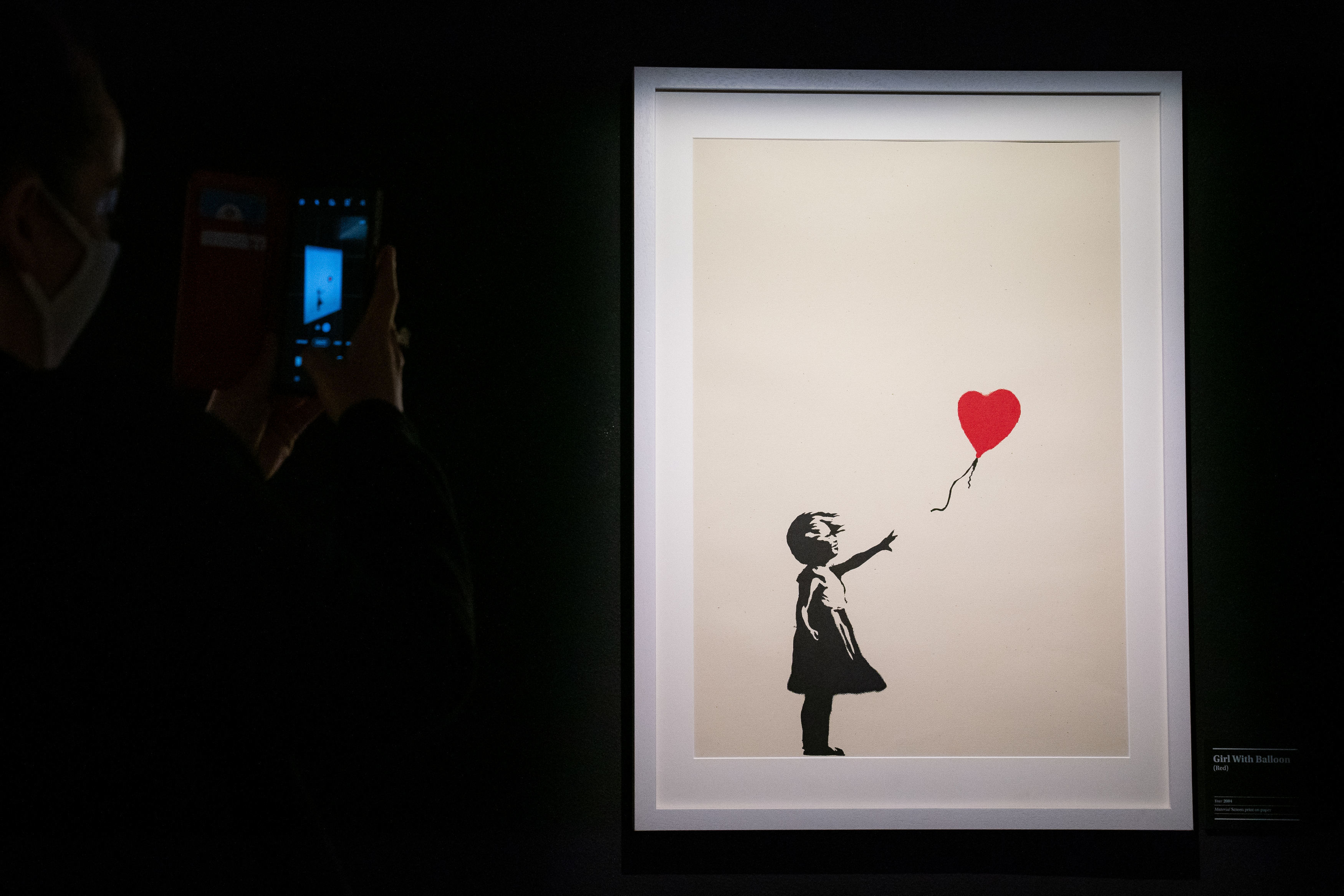 ▲英國知名藝術家班克斯（Banksy）的畫作「女孩與氣球」（Girl With Balloon）。（圖／達志影像）