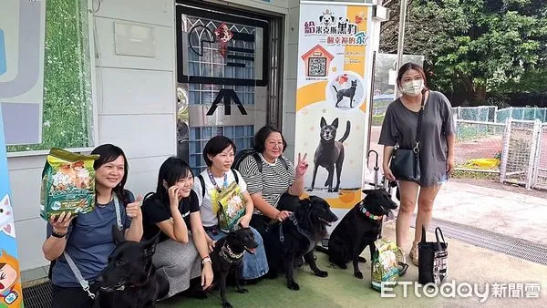 ▲一整排帥歐告站出來！打破「黑狗不吉利」迷信　飼主讚忠心又聰明（圖／新北市動保處提供）