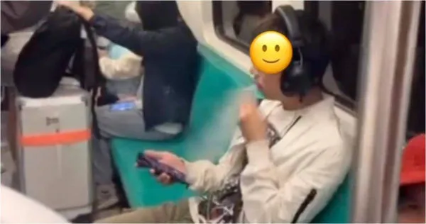 有男子在高雄捷運上公然抽菸。（圖／ Threads／@fen.2_6）