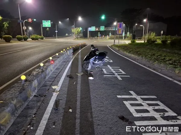 ▲▼日籍女學生無照酒駕，自撞分隔島。（圖／記者許宥孺翻攝）